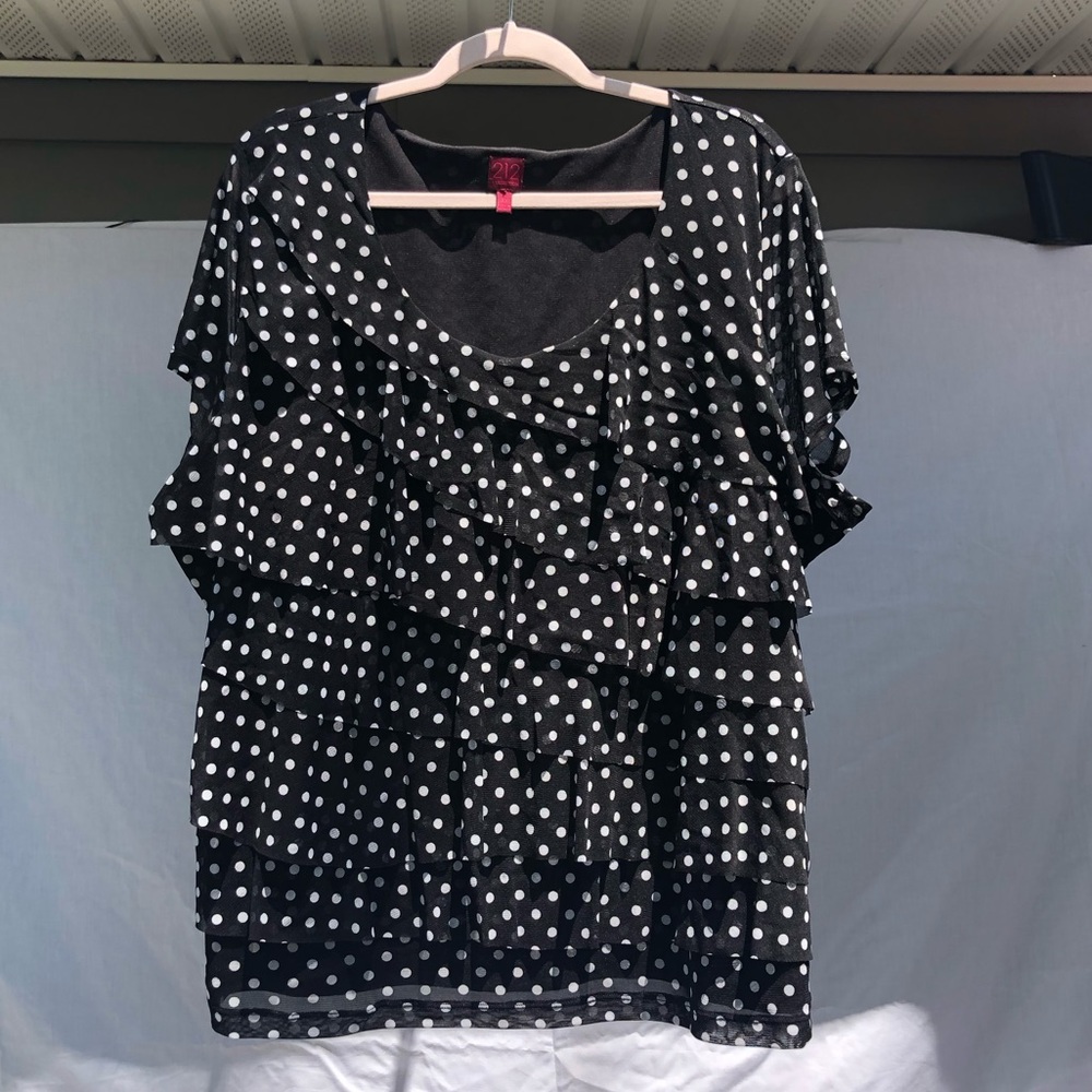Never worn polka dot, ruffled top.